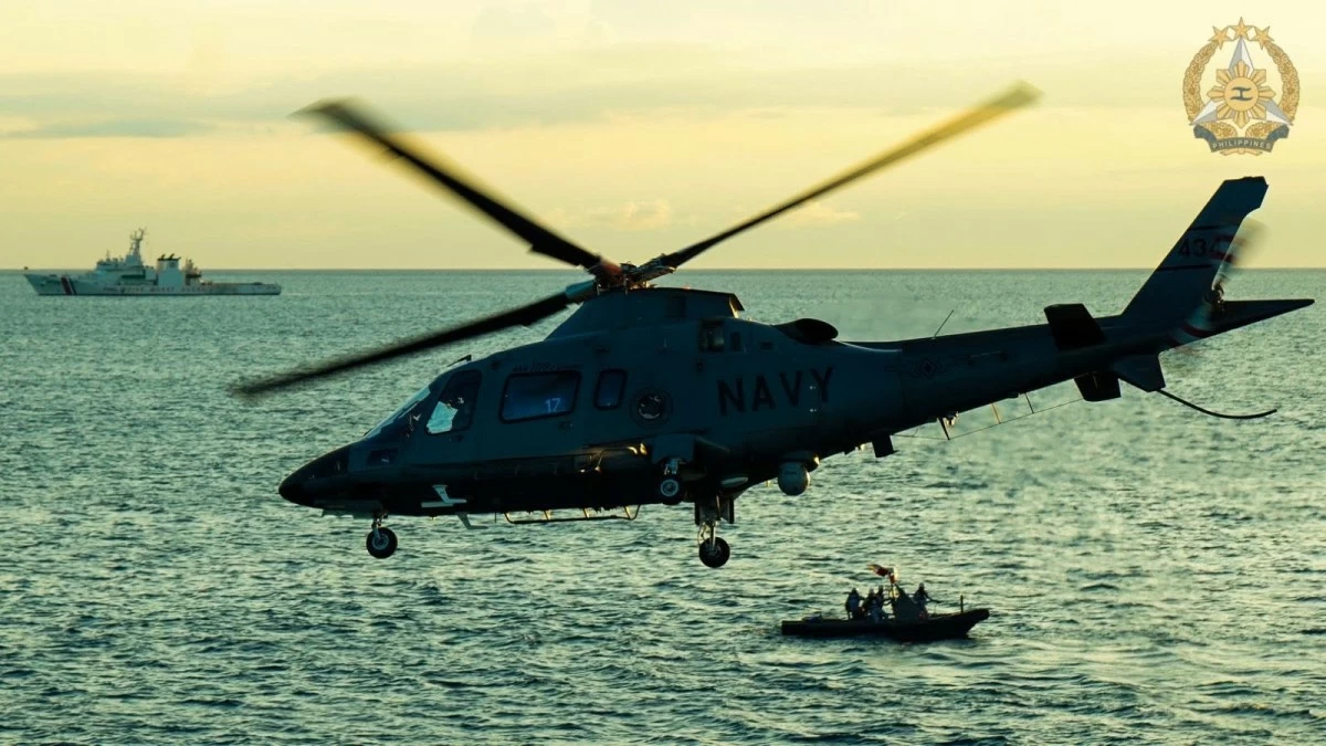 An AW109 helicopter approaches the flight deck of BRP Diego Silang (FFG7) for landing during flight operations, highlighting the seamless integration of naval and air assets during the PH-US Bilateral Maritime Cooperative Activity in the West Philippine Sea. (Photo: Armed Forces of the Philippines)
