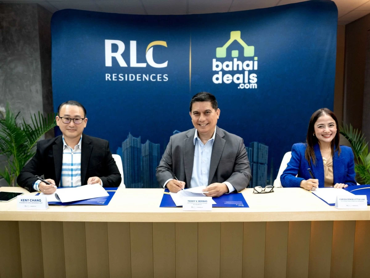 RLC Residences and Bahaideals.com formalize a partnership aimed at helping overseas Filipinos navigate the homebuying process. In photo are Keny Chang, Teddy V. Bernas, and RLC Residences Vice President and Overall Head of Sales Denise Lyttle-Lao. (Photo: RLC Residences)