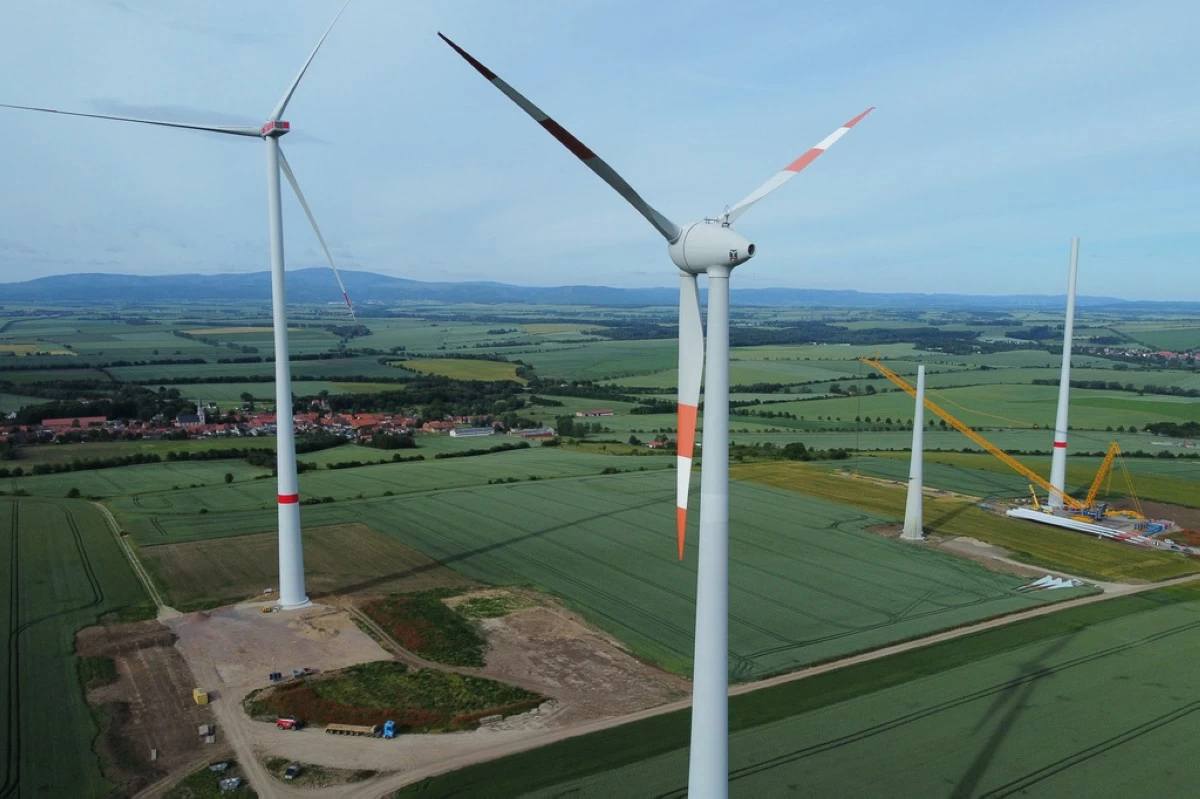 FILE - Wind turbines stand in various stages of completion near Deersheim, Germany, June 10, 2026. (AP Photo/Matthias Schrader, File)
