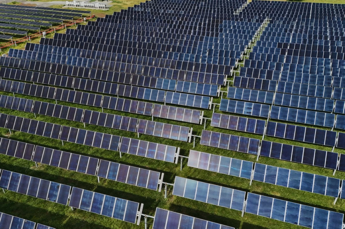 FILE - Solar panels operate April 28, 2026, at a farm in Christiana, Tenn. (AP Photo/Joshua A. Bickel, File)