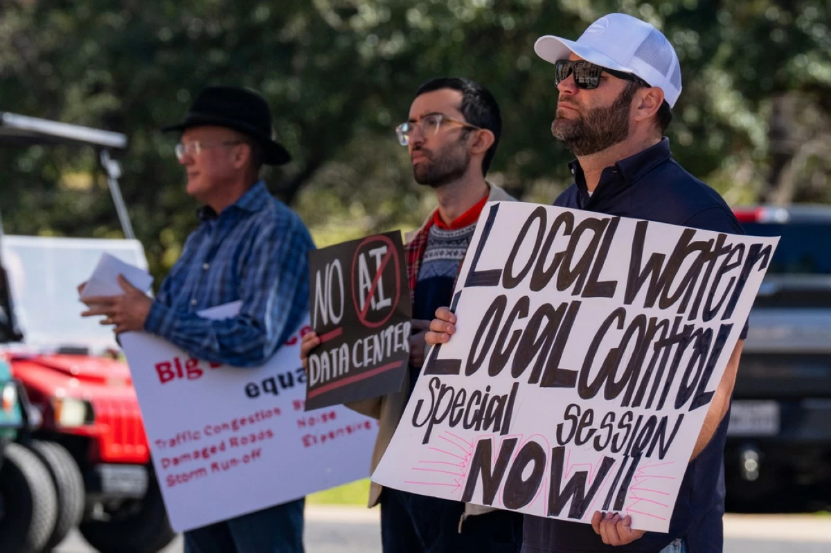 Advocacy groups and community members protest laws surrounding data centers while outside the Texas Capitol, in Austin, Texas, Feb. 23, 2026. (Mikala Compton/Austin American-Statesman via AP, File)