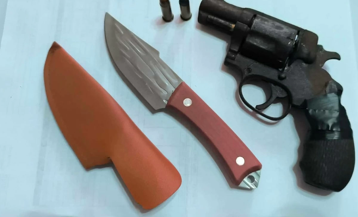 The photo shows the knife and the gun seized from a 14-year old Grade 8 student and a 15-year old Grade 10 student in Aparri, Cagayan during a police search of their bag based on the request of their principal on June 26, 2026. (photo: PNP)