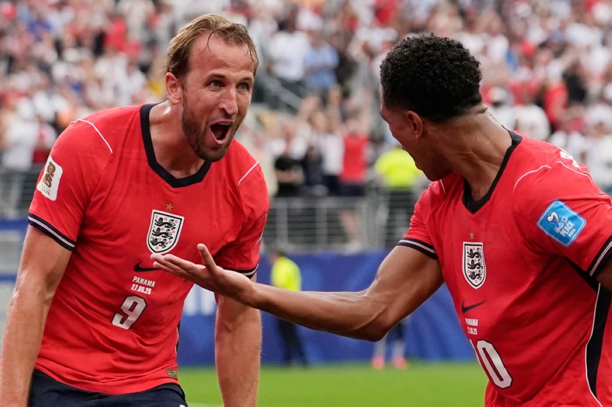England's Harry Kane (9) celebrates with England's Jude Bellingham (10) after scoring their second goal during the World Cup Group L soccer match between Panama and England in East Rutherford, N.J., near New York, Saturday, June 27, 2026. (AP Photo/Steve Luciano)