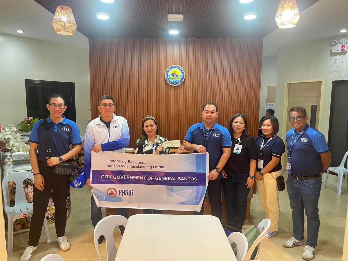 Representatives from the Pasig City government's Management Information Systems Office, Tricycle Operations and Regulatory Office, and Disaster Risk Reduction and Management Office deliver P5 million in financial assistance to Sarangani Province, Davao Occidental, and General Santos City following the magnitude 7.8 earthquake. (Photos from Pasig PIO)