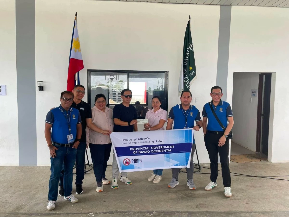 Representatives from the Pasig City government's Management Information Systems Office, Tricycle Operations and Regulatory Office, and Disaster Risk Reduction and Management Office deliver P5 million in financial assistance to Sarangani Province, Davao Occidental, and General Santos City following the magnitude 7.8 earthquake. (Photos from Pasig PIO)