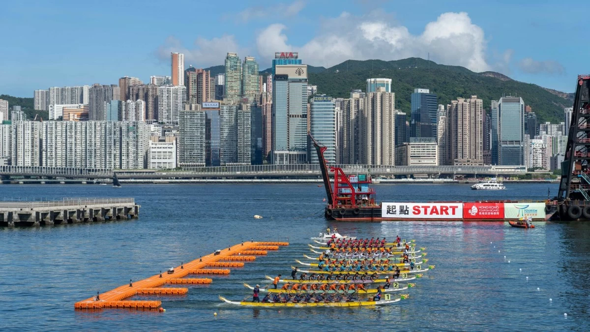 ROW YOUR BOAT Over 220 international teams race against each other at Victoria Harbor for the Hong Kong International Dragon Boat Races (Photo Hong Kong Tourism Board)