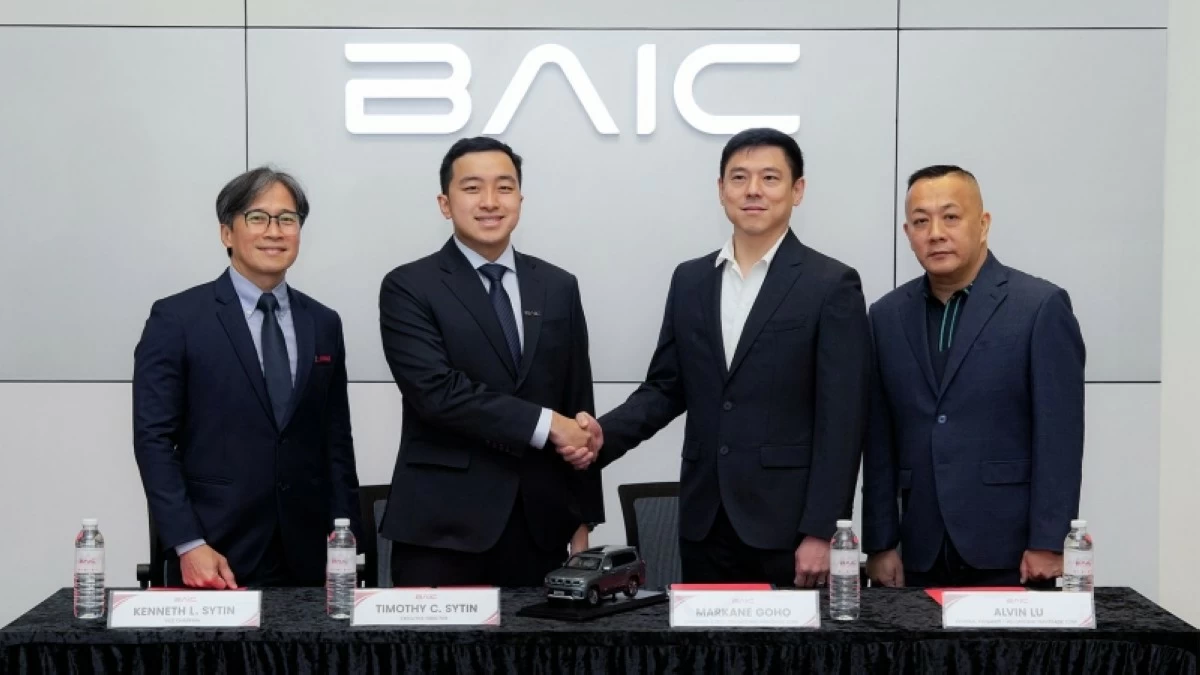 From left: Kenneth L. Sytin, UAAGI Vice Chairman; Timothy C. Sytin, BAIC Brand Head; Markane Goho, MG Gateway Mantrade Corp Chairman & CEO; and Alvin Lu,  MG Gateway Mantrade Corp General Manager.