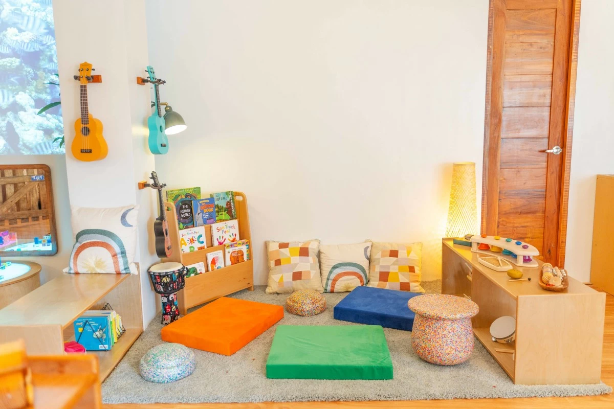 The Piazza serves as a communal gathering space for imaginative play, storytelling, and shared discovery.

