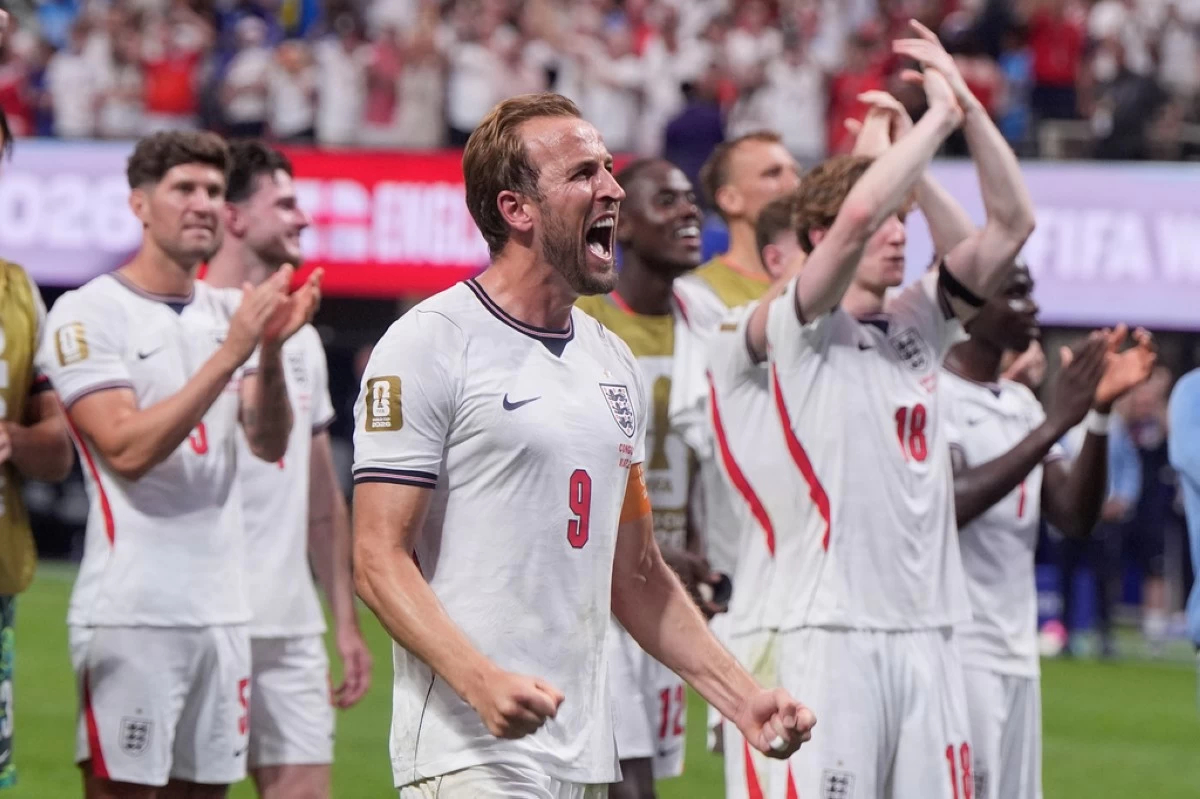 England's Harry Kane celebrates after scoring both goals in a World Cup Round of 32 soccer match against Congo in Atlanta, Wednesday, July 1, 2026 (AP Photo/Mike Stewart)