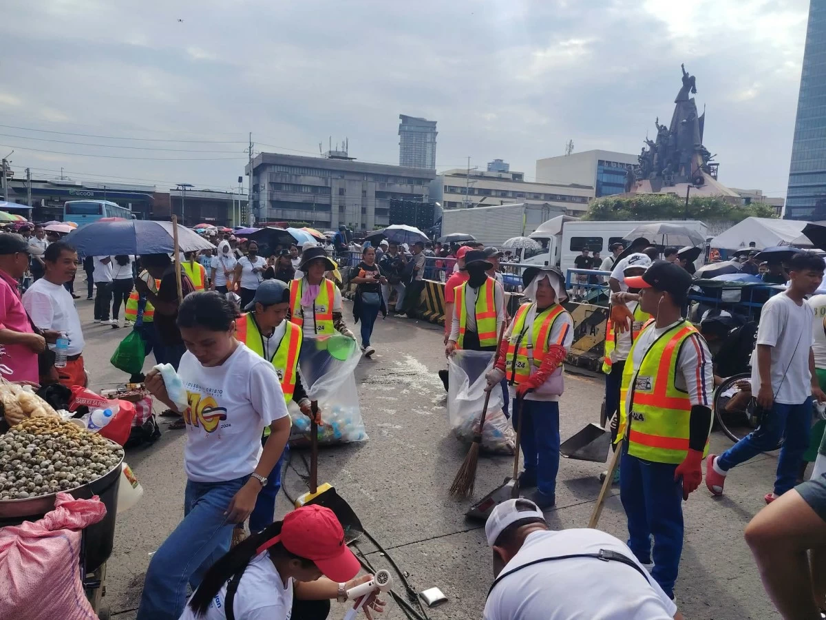 Cleanup operations continue as the Department of Sanitation and Cleanup Works of Quezon City (DSQC) removes and hauls accumulated garbage around White Plains amid the Iglesia Ni Cristo (INC) mass assembly on July 1, 2026. (Photo courtesy of the Quezon City government)