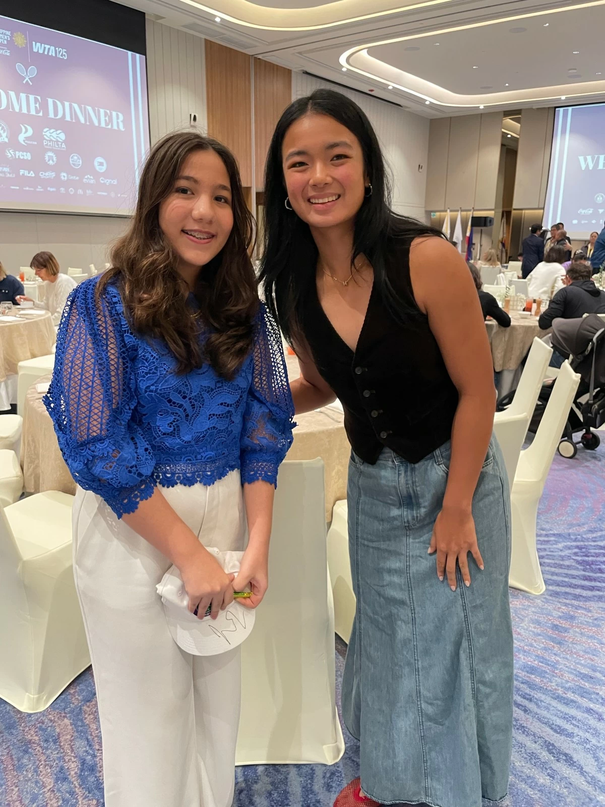 YOUNG TALENTS Lucia with Filipino professional tennis player Alex Eala.