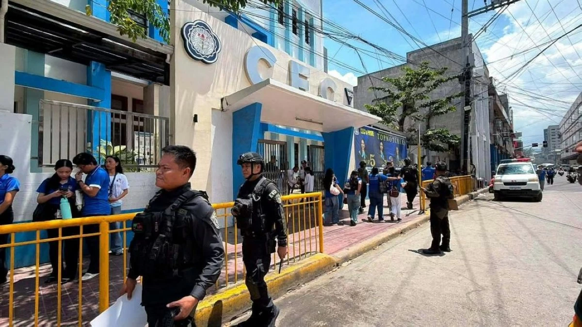 POLICE arrive at the Cebu Eastern College in Cebu City after a shooting threat circulated on Thursday morning, July 2. (Carbon Police Station) 