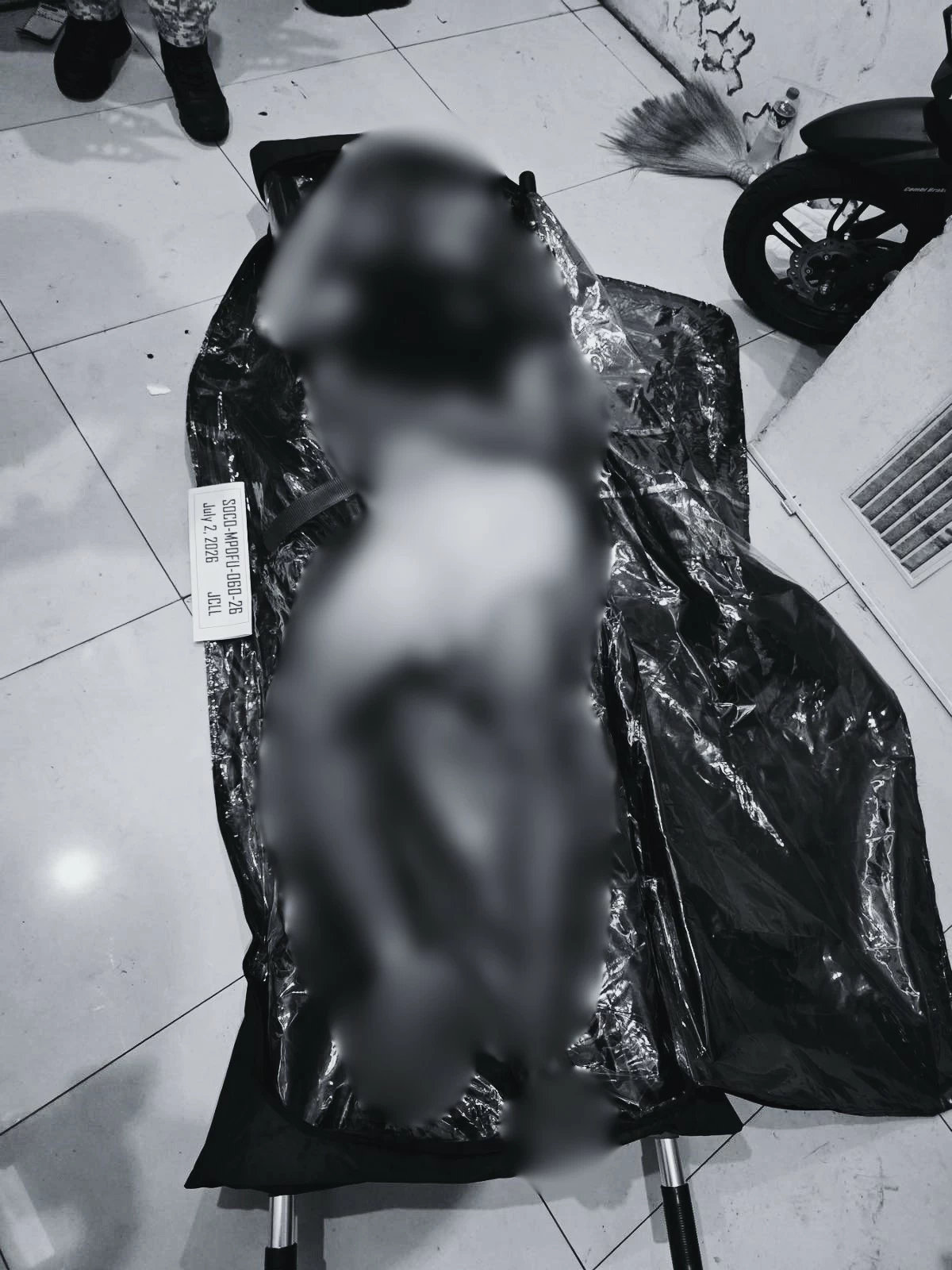 A building caretaker was found dead after he was pinned by an elevator inside a building in Balut, Tondo, Manila on Thursday, July 2. (Photos from MPD)