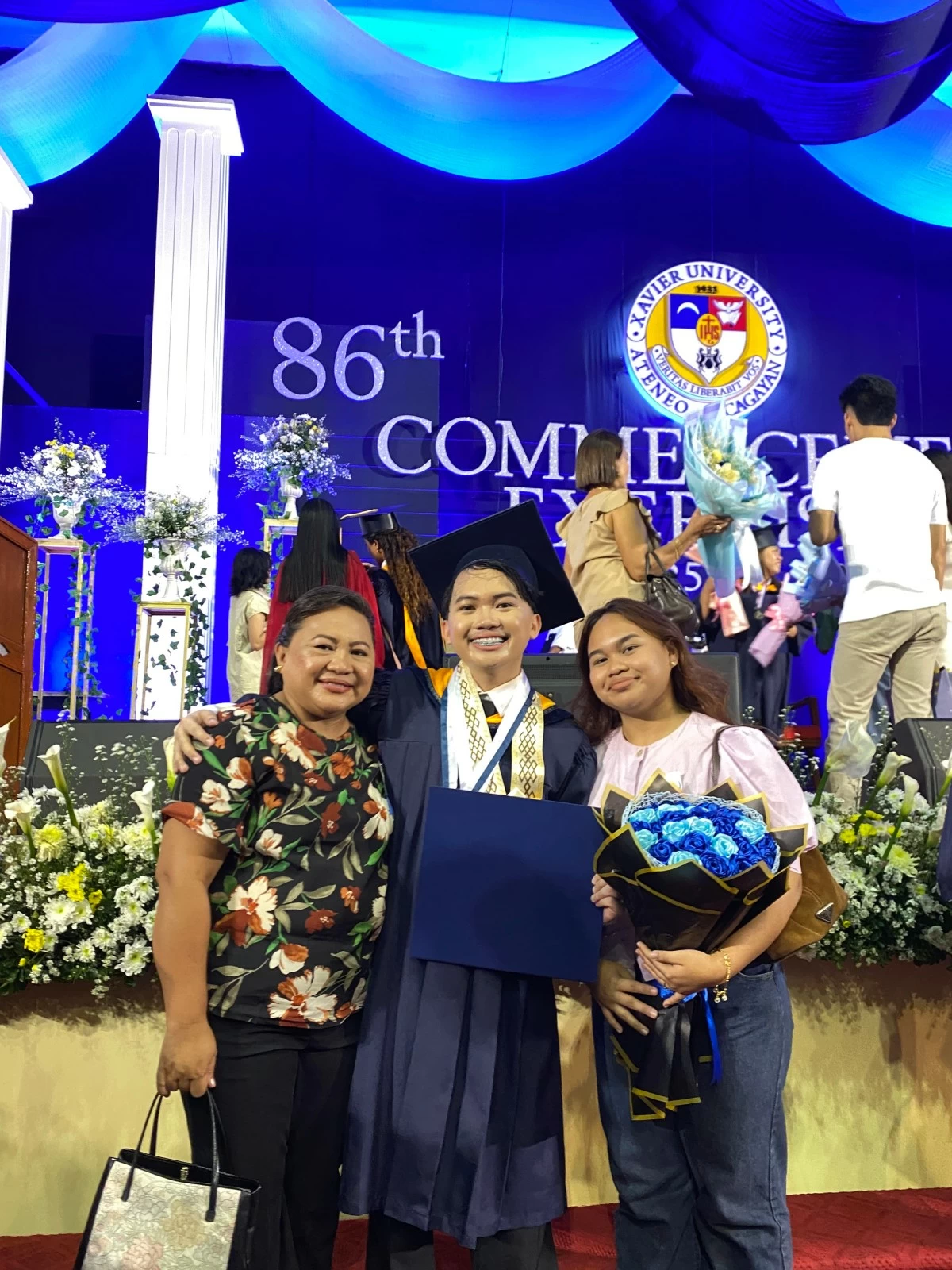 Steven faced fear and uncertainty at the start of his BS Accountancy journey, but with the support of his parents, he turned challenges into triumphs. IN PHOTO: From left to right, his mother Lucita David, Steven, and his sister Kyle Nicole David during his college graduation ceremony.