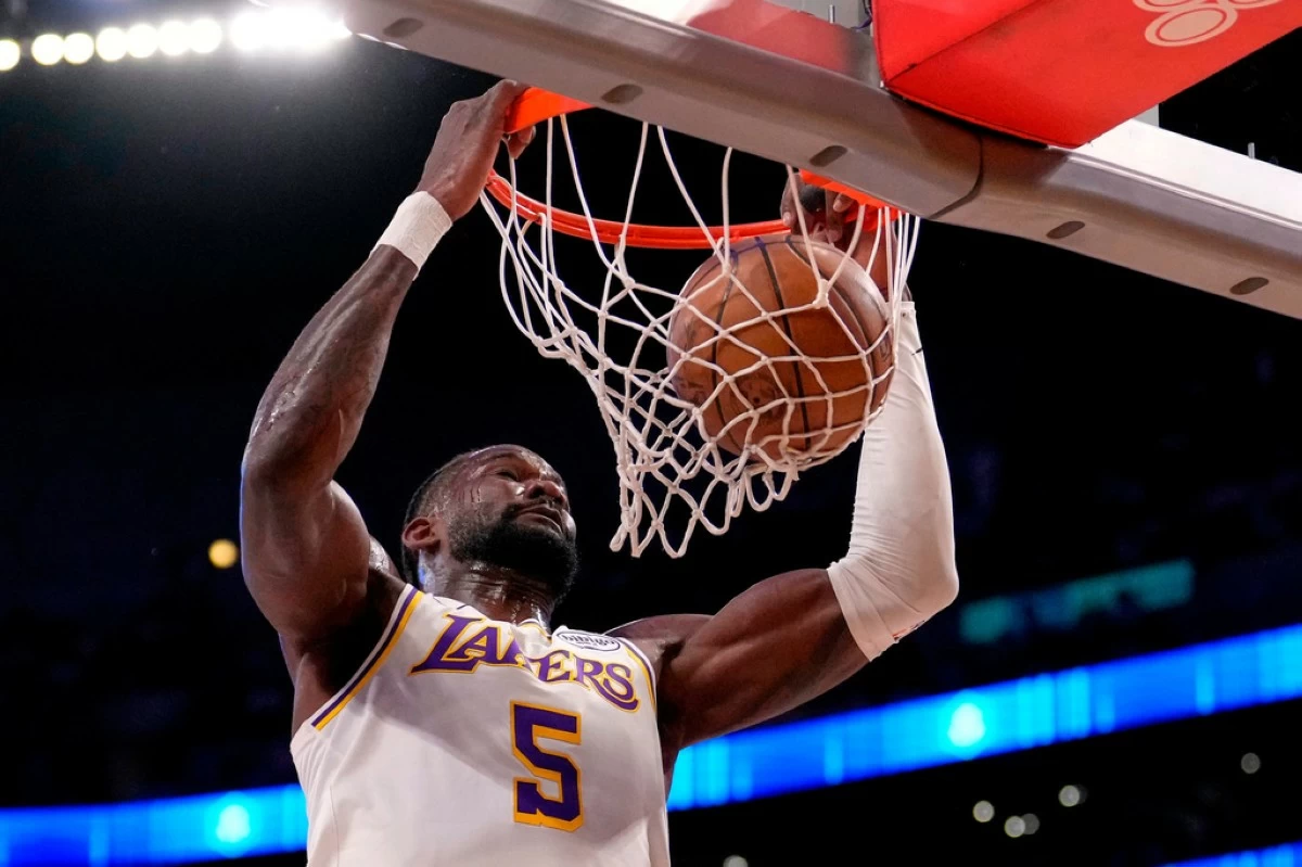 FILE - Los Angeles Lakers center Deandre Ayton dunks during the first half of Game 3 in a second-round NBA basketball playoffs series against the Oklahoma City Thunder, May 9, 2026, in Los Angeles. (AP Photo/Mark J. Terrill, File)