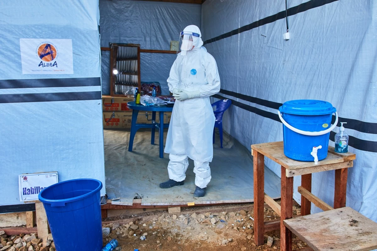 A health worker stands at the Evangelical Medical Center, in Bunia, eastern Congo, Friday, July 3, 2026, where Ebola clinical trials are scheduled to take place. (AP Photo/Dirole Lotsima Dieudonne)