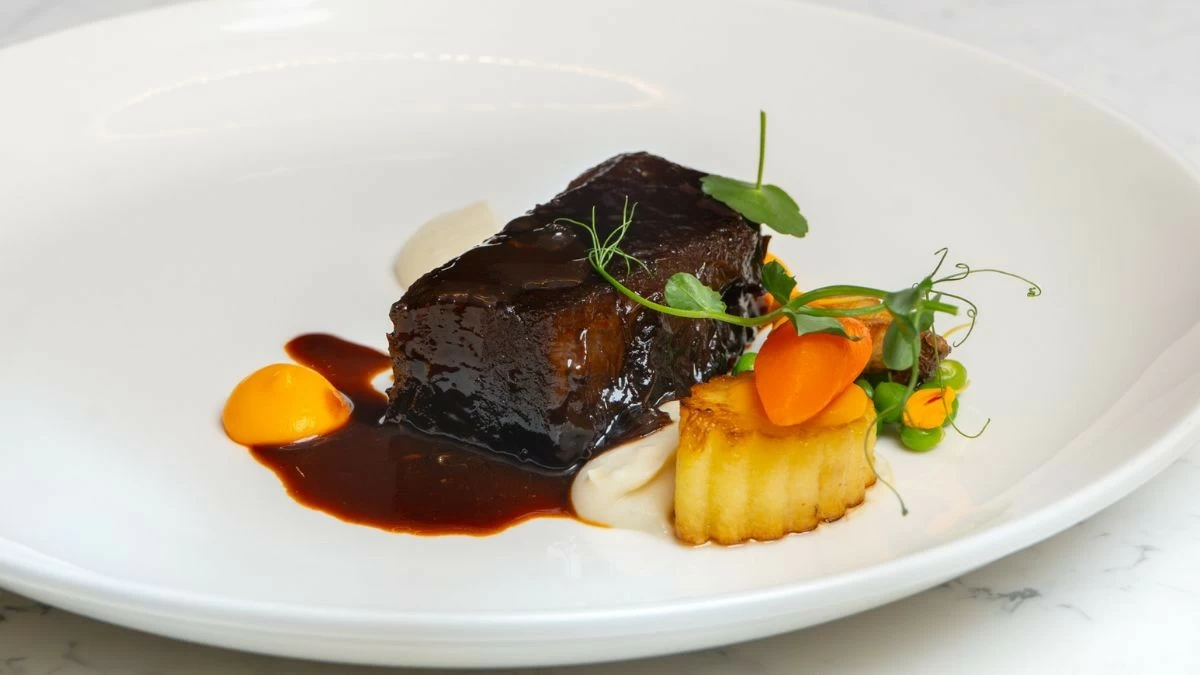 AGED TO PERFECTION Leyte cacao cocoa powder-aged Wagyu and smoked beef short ribs are paired with celeriac purée and smoked cacao husk jus (Photo: The Westin Manila)