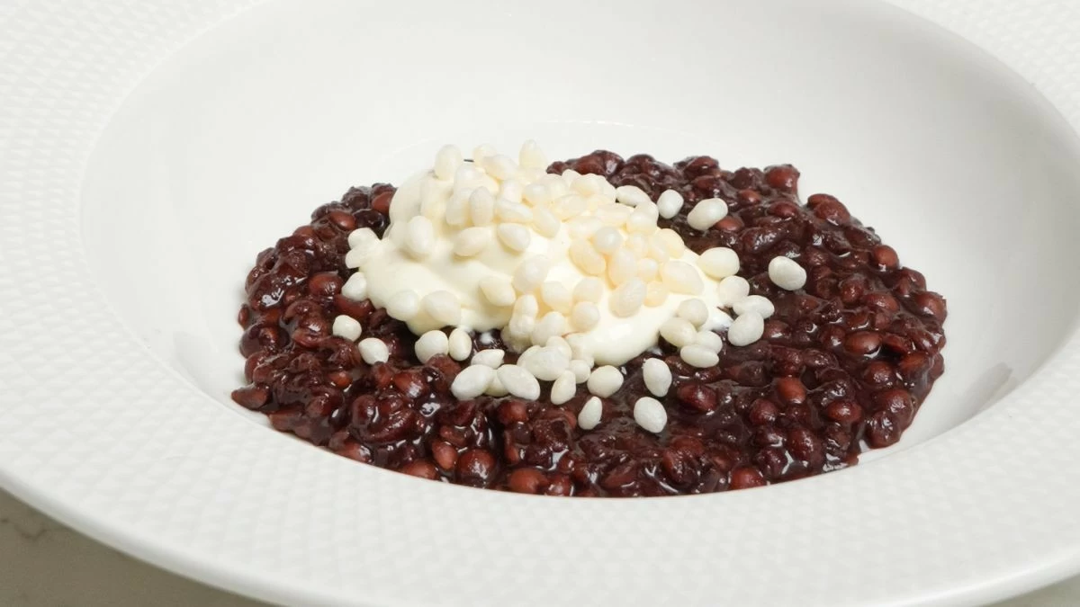 COMFORT REIMAGINED Adlai champurrado made with Samar cacao is topped with dried fish espuma and rice crisps, giving the Filipino comfort dish a refined interpretation (Photo: The Westin Manila)