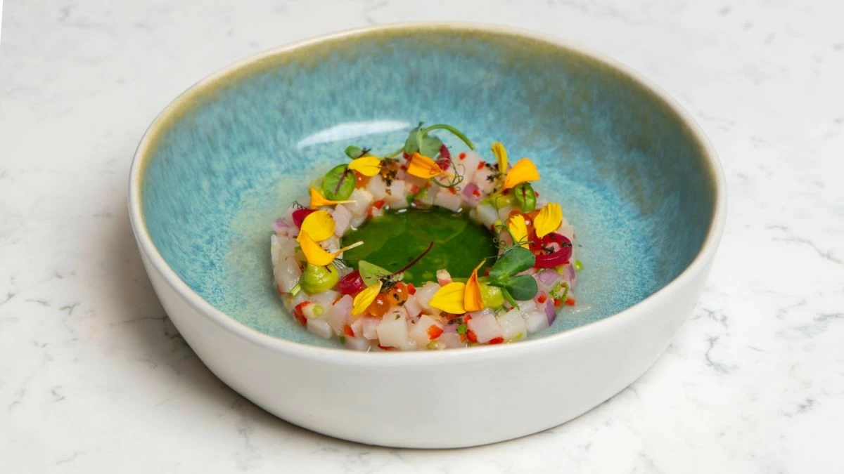 FRESH BEGINNING Scallops ceviche is paired with avocado, Samar cacao fermented vinegar, and herb oil to represent the fermentation stage of chocolate making (Photo: The Westin Manila)