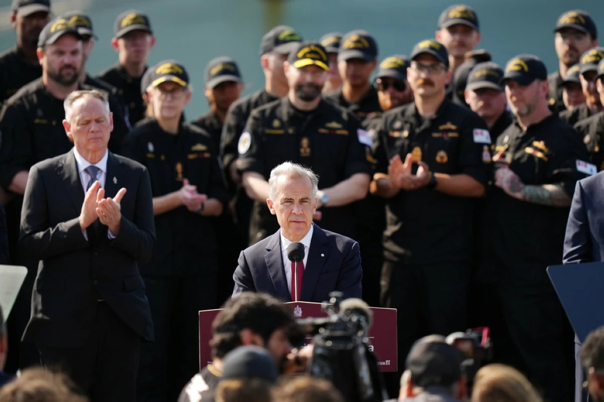 Canada Prime Minister Mark Carney makes an announcement at HMC Dockyard in Halifax on Monday, July 6, 2026. (Darren Calabrese/The Canadian Press via AP)