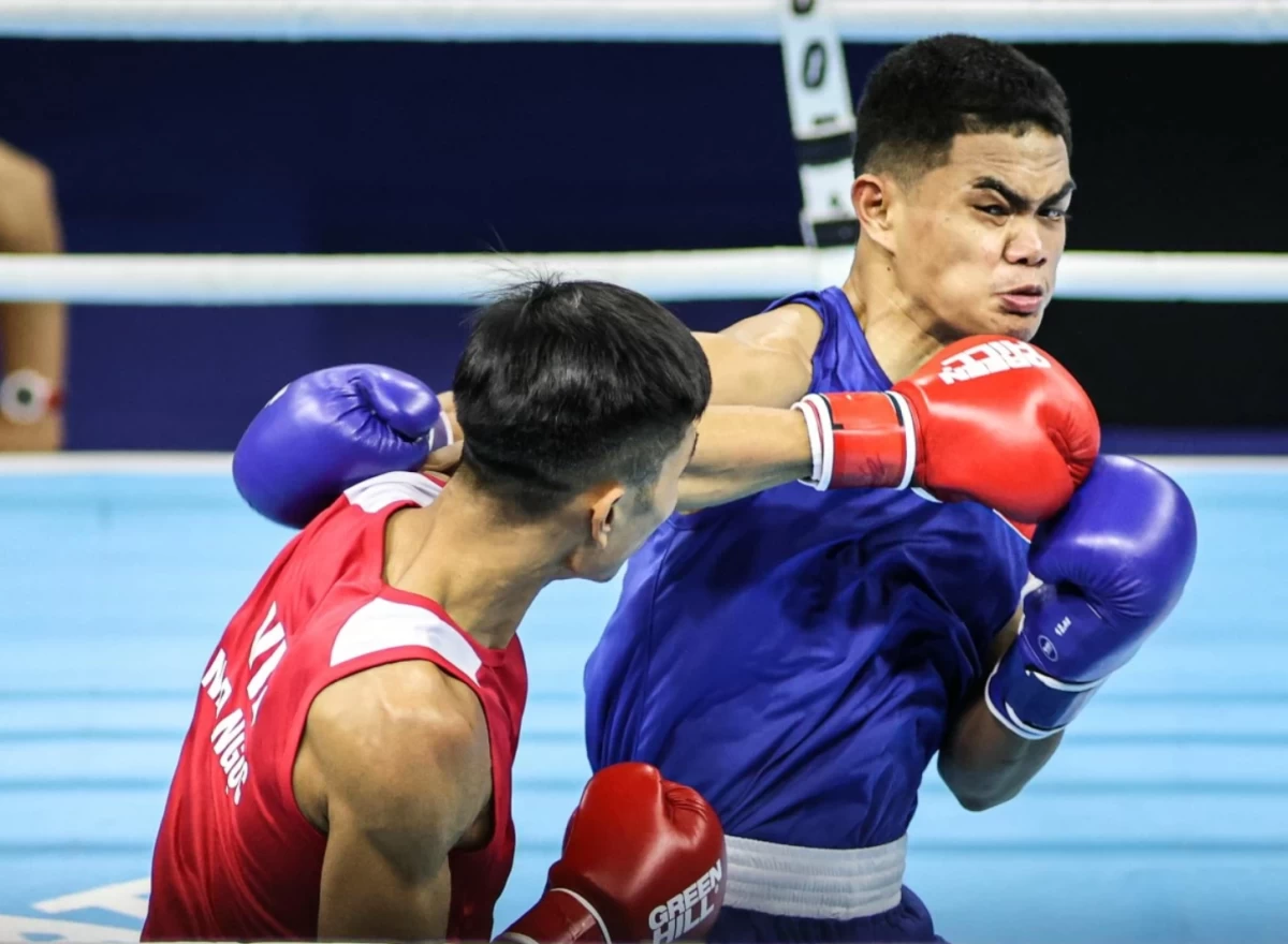 Mark Ashley Fajardo, in blue (File Photo)