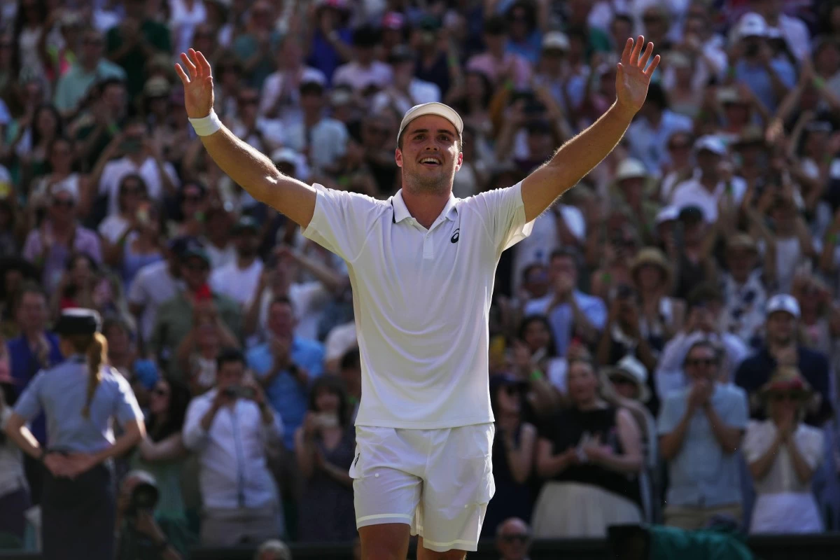 Arthur Fery of Britain reacts to winning against Flavio Cobolli of Italy in their quarter-final men's singles match at the Wimbledon Tennis Championships in London, Wednesday, July 8, 2026. (AP Photo/Brian Inganga)