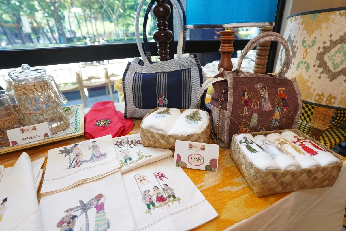 Embroidered bags, pouches, table linens, home accents by Cheeky Chic
