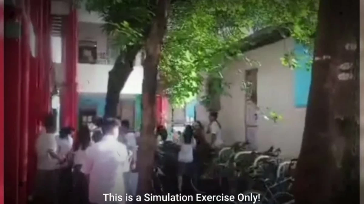 The  active shooter simulation exercise conducted by the Taguig police in Napindan Integrated School (Screenshot from Taguig police's video) 