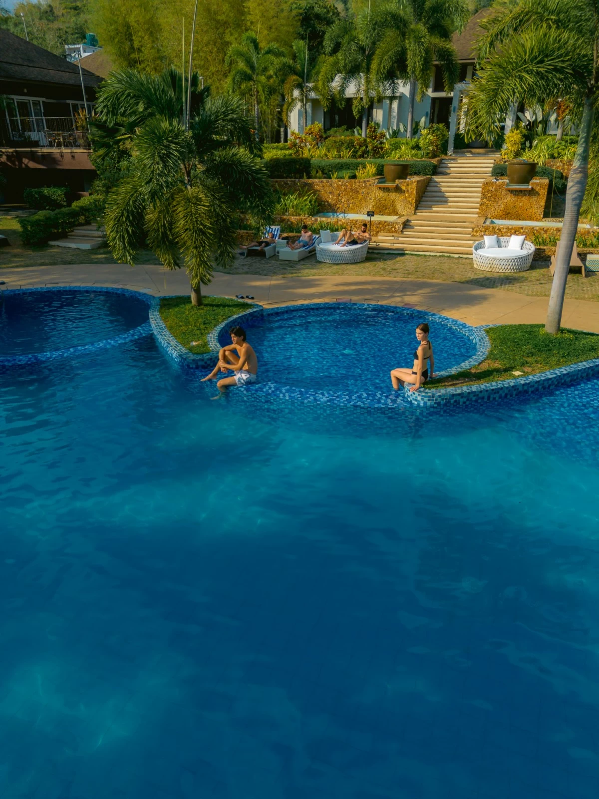 The gentle curves of Bacau Bay Coron's signature pool and roofline were inspired by the humble cashew, one of Coron's best-known local products.