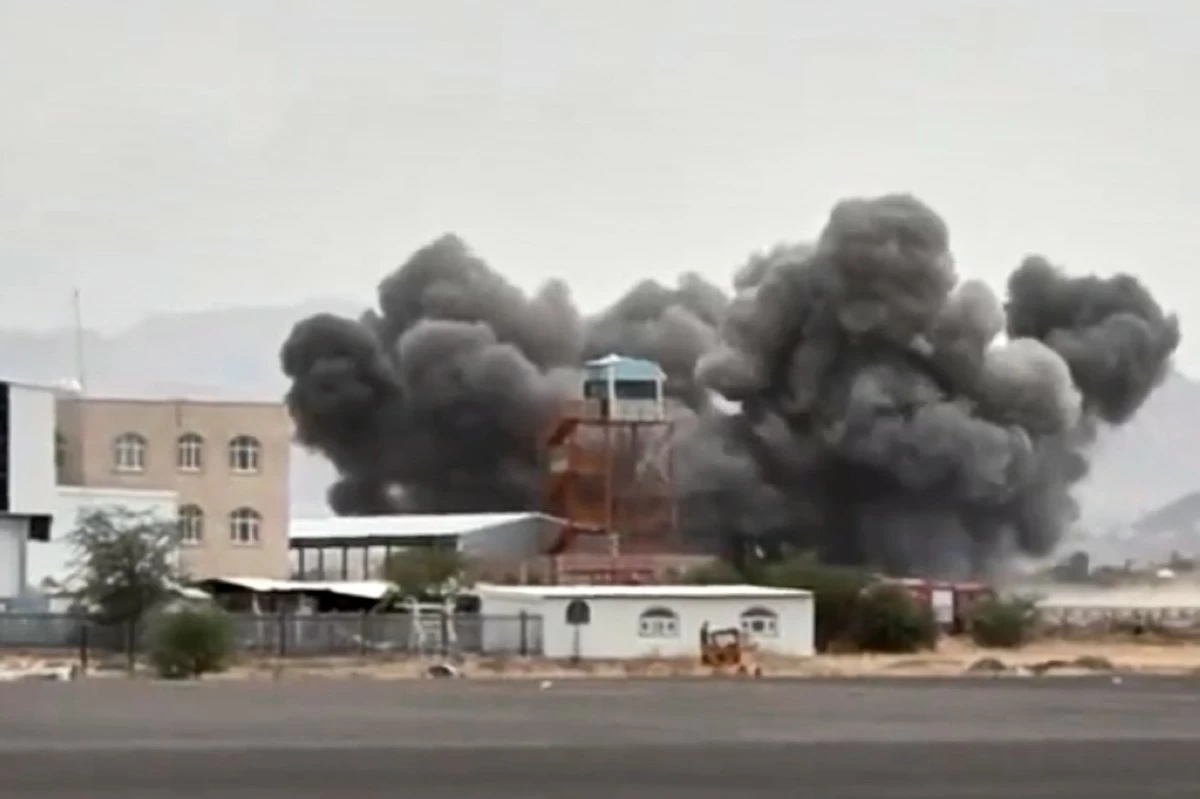 This image taken from video broadcast by Al-Masirah TV, a Houthi-controlled news channel, shows an explosion at the Sanaa International Airport compound during what the Iranian-backed Houthi rebels in Yemen said were several Saudi airstrikes in Sanaa, Yemen, Monday, July 13, 2026. (Al-Masirah TV via AP)