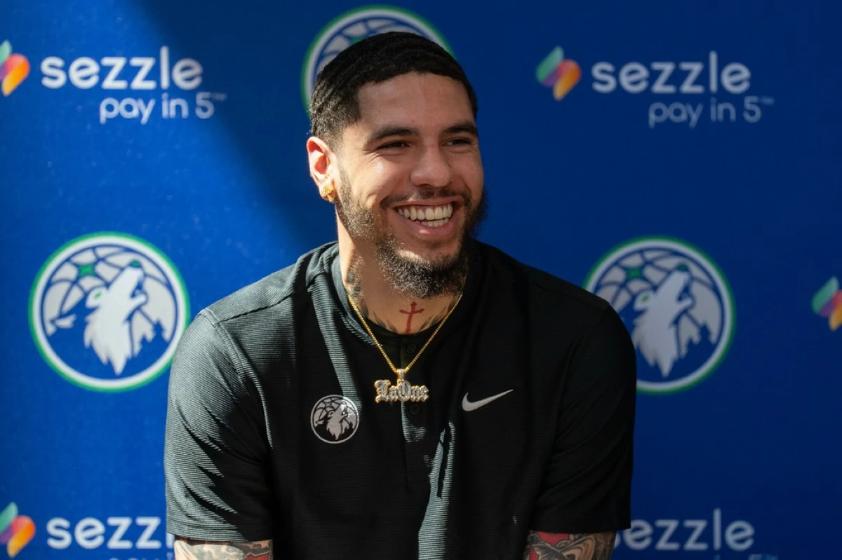 Minnesota Timberwolves newly-acquired point guard LaMelo Ball laughs during an introductory press conference at the Target Center in Minneapolis on Tuesday, July 14, 2026. (Alex Kormann/Minnesota Star Tribune via AP)