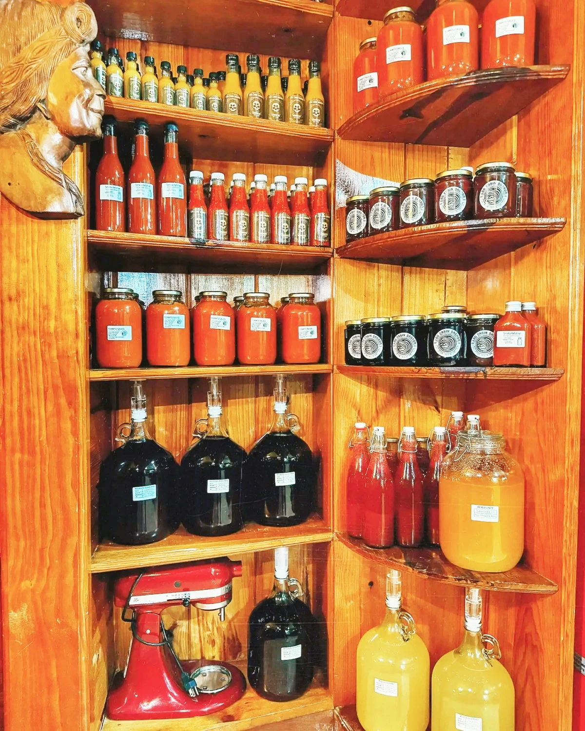 VALUE-ADDED — Homemade products lined up on shelves at Log Cabin Sagada. 