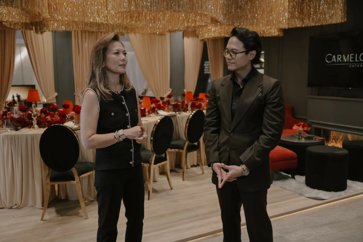 Chef Cristina Santiago of Carmelo’s Catering and Kevin Lapena