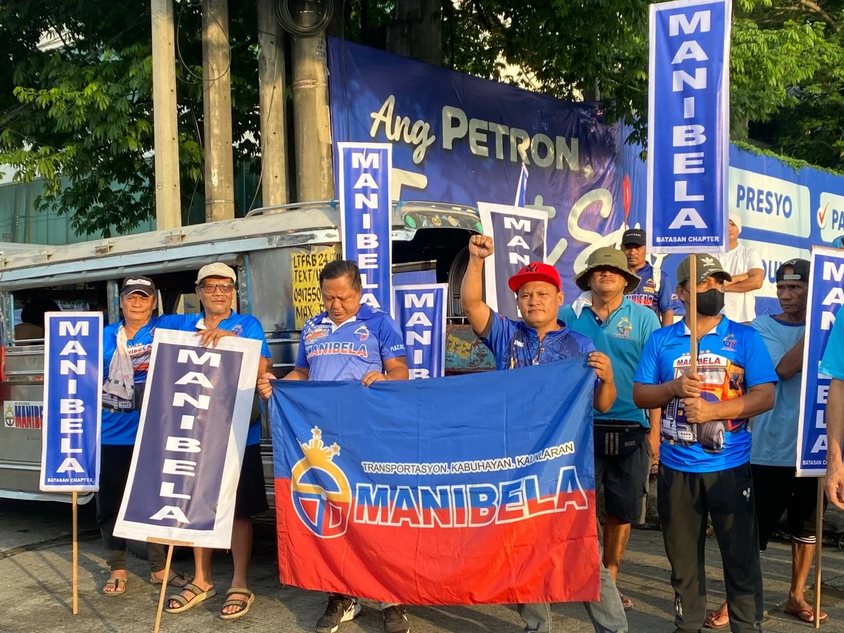 Members of transport group Manibela gather in Philcoa, Quezon City, on Wednesday morning, July 22, as the group stages a two-day nationwide transport strike. (Trixee Rosel/MANILABULLETIN)