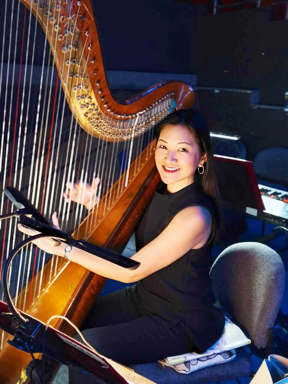 DREAM JOB — Banta with her harp in this year’s Manila Symphony Orchestra season opener conducted by Russian Maestro Alexander Vikulov.