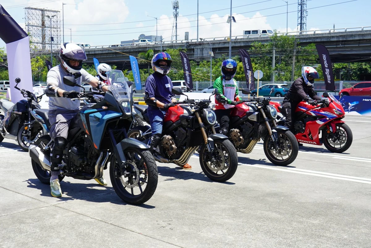 From left: an NX500, two CB 650Rs, and a CBR500R, all equipped with Honda's E-Clutch system.