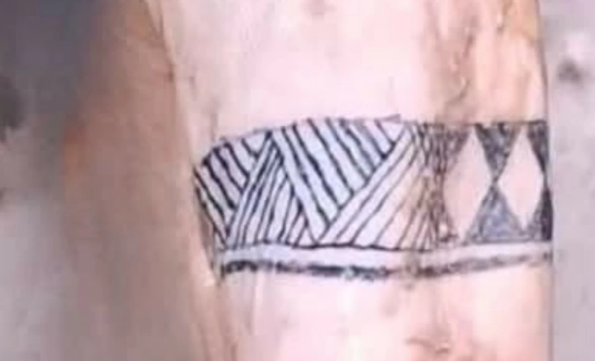 Tattoo seen on the woman’s body recovered in Taguig creek (Photo from Taguig police)