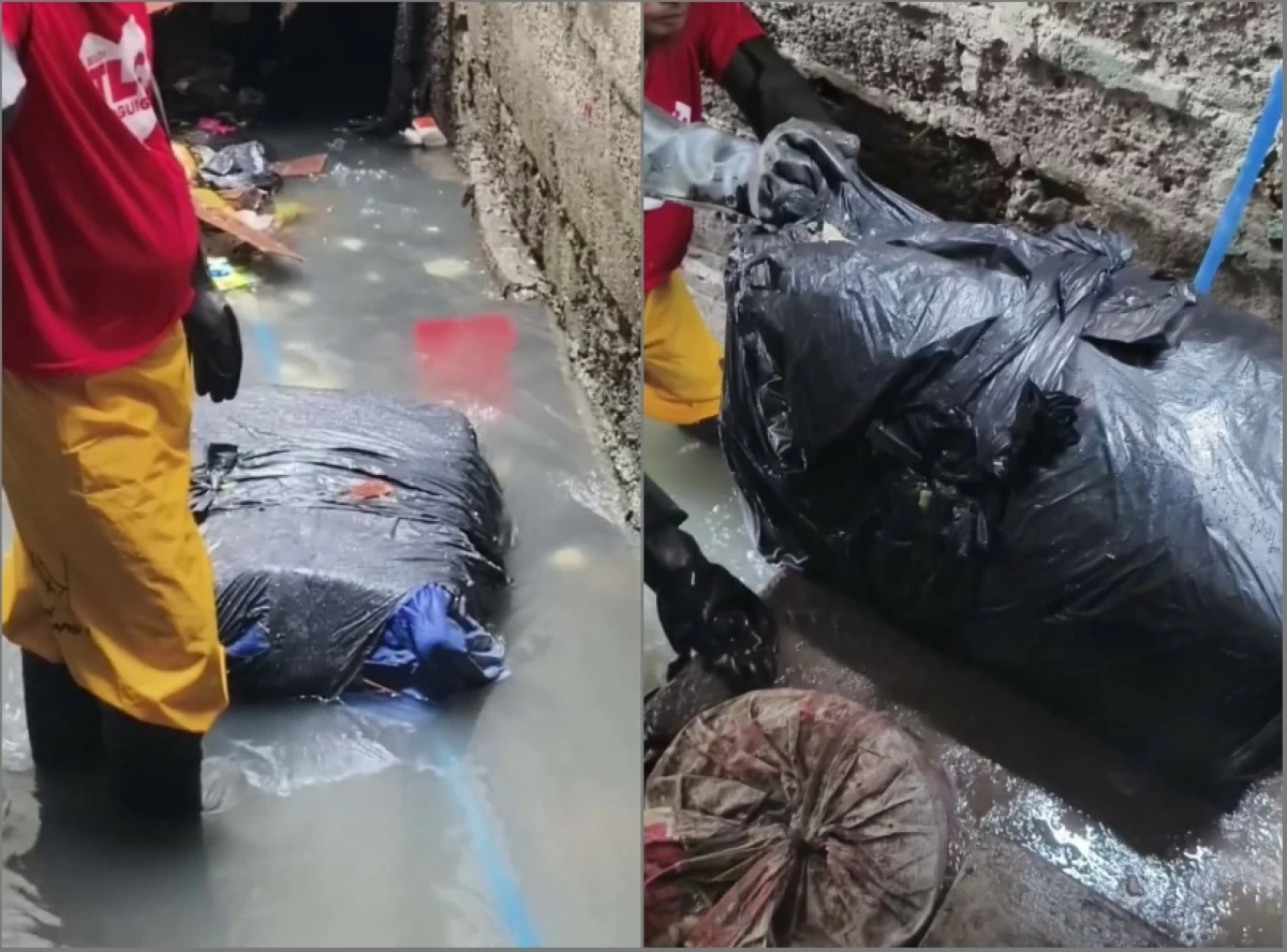 The suitcase containing the body of a woman found in Taguig creek on July 24 (Screenshots from Ysrael's video on Facebook)