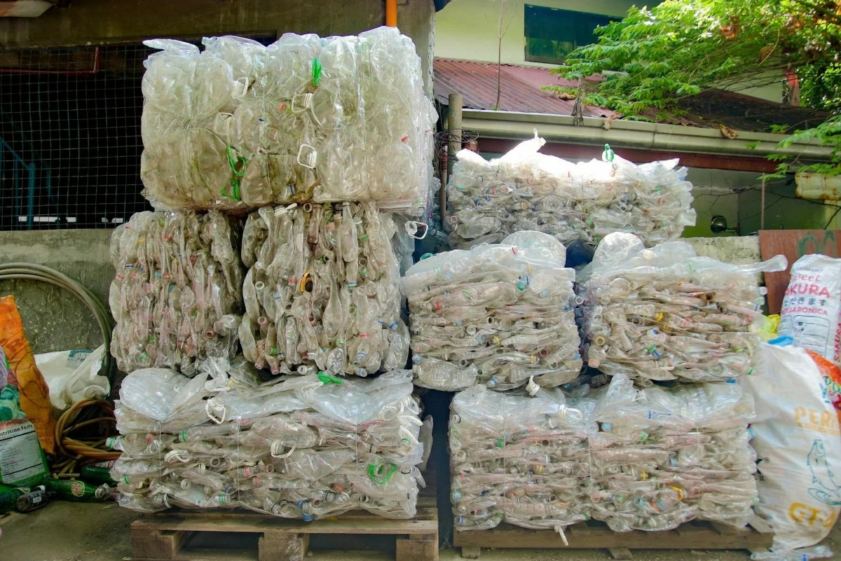 PET bottles are processed and compacted into bales in the MRF of Valenzuela City.