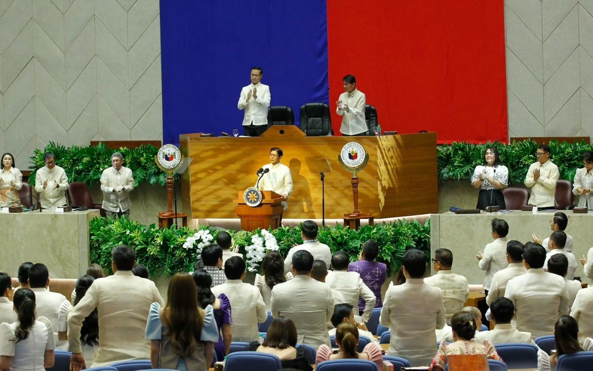President Ferdinand 'Bongbong' Marcos Jr. delivers his fifth State of the Nation Address (SONA) at the Batasang Pambansa in Quezon City, July 27, 2026. In his address, Marcos outlined his administration’s accomplishments, key policy priorities, and legislative agenda for the coming year. He is joined by Senate President Win Gatchalian and House Speaker Bodjie Dy. (Mark Balmores)