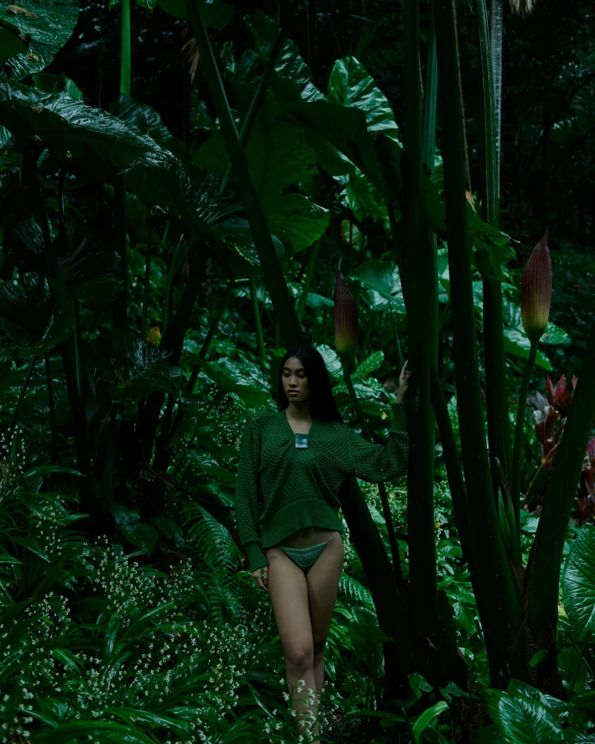 Knitted draped top in solihiya pattern in cotton, piña (pineapple fiber) with mother of pearl clip in forest jade color