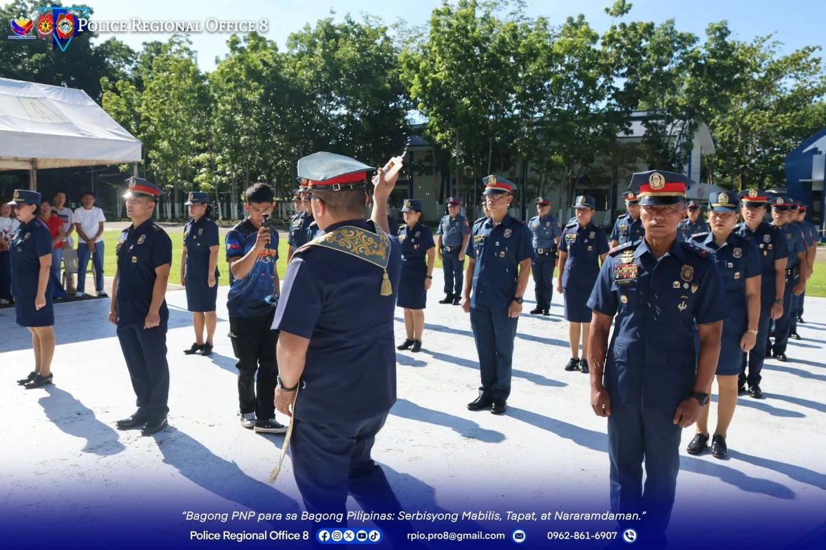 A POLICE chaplain blesses newly promoted cops in Eastern Visayas. (FB)