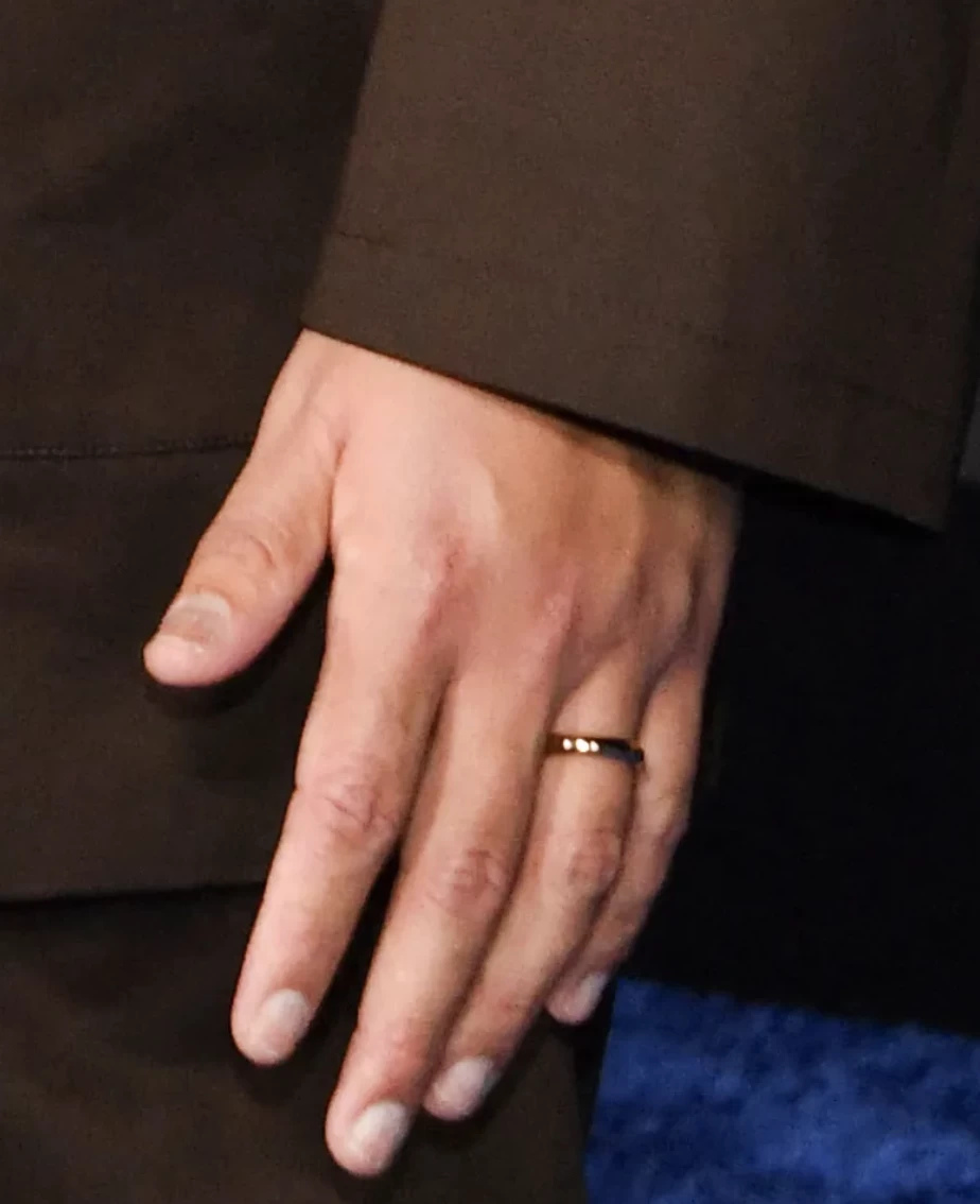 Jacob Batalon wearing a gold band 