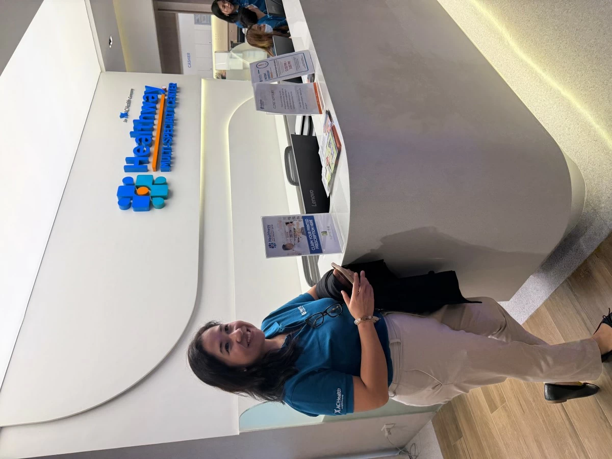 The receiving area of the AC Health-Healthway Multi-Specialty Center at One Ayala; and my terrific guide, Dra. Michelle Anievas.