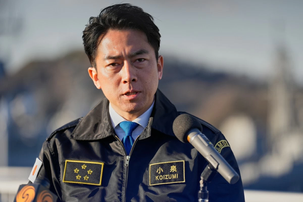 Japan's Defense Minister Shinjiro Koizumi speaks with media after meeting with South Korea's Defense Minister Ahn Gyu-back at the headquarters of the Japan Maritime Self-Defense Force Yokosuka District, south of Tokyo, on Friday, Jan. 30, 2026. (AP Photo/Eugene Hoshiko, File)