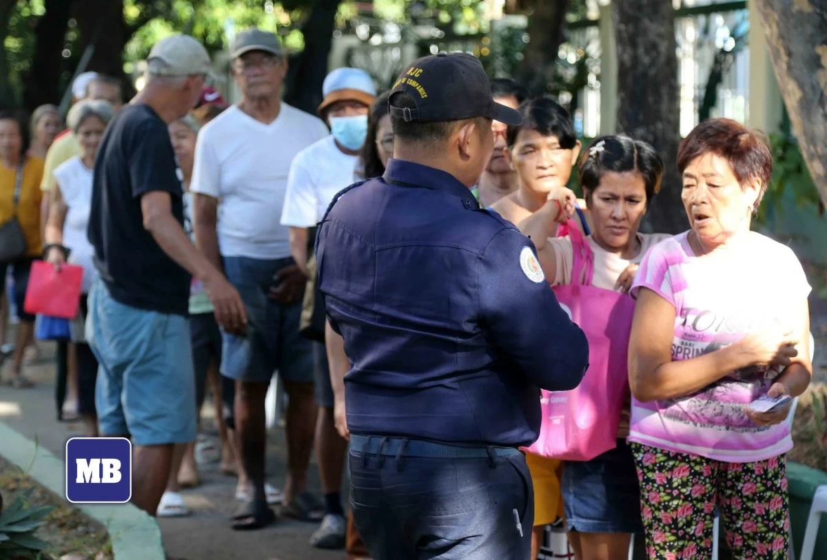 Qualified beneficiaries—including senior citizens, persons with disabilities, solo parents, and Pantawid Pamilyang Pilipino Program (4Ps) members—line up to buy rice priced at P20 per kilo at the Bureau of Plant Industry in San Andres, Malate, Manila on April 27, 2026. (MANILA BULLETIN File Photo | Mark Balmores)