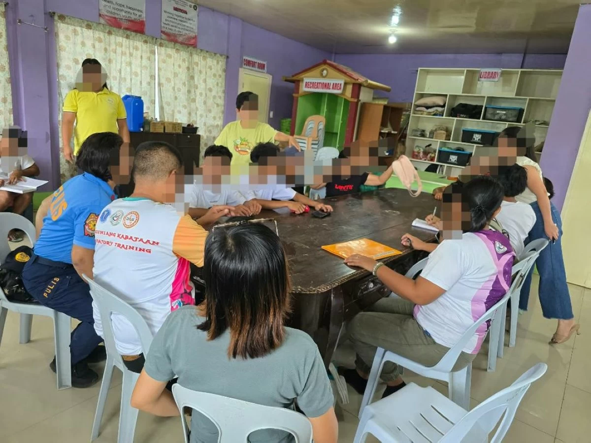 PARENTS and guardians of high school students meet barangay officials, Municipal Social Welfare and Development Office (MSWDO), and the Women and Children Protection Desk (WCPD) to discuss the incident and possible intervention measures. (La Castellana Municipal Police Station)

