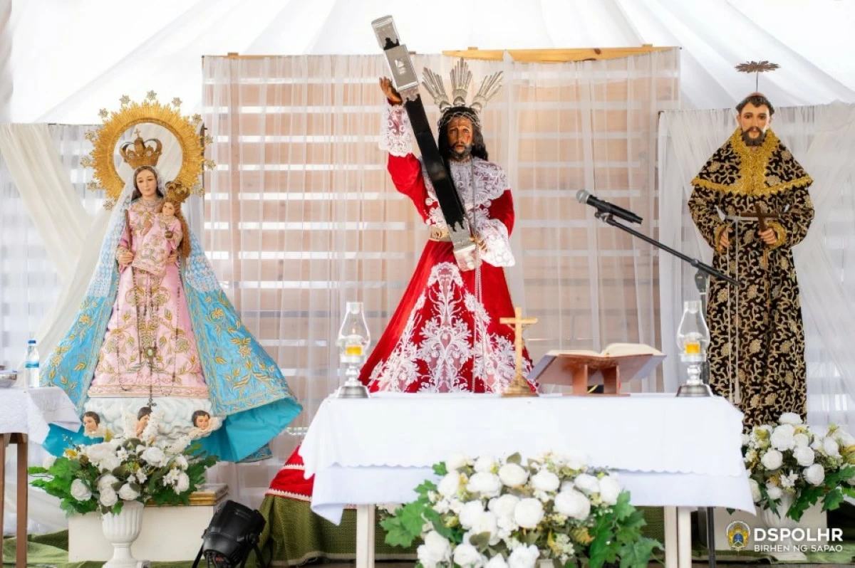The religious images-Our Lady of the Holy Rosary, Jesus Nazareno, and Saint Francis of Assisi were brought to Cardona Fish port during the observance of the second anniversary of the lake's consecration (photo from La Virgen de Sapao's FB page)