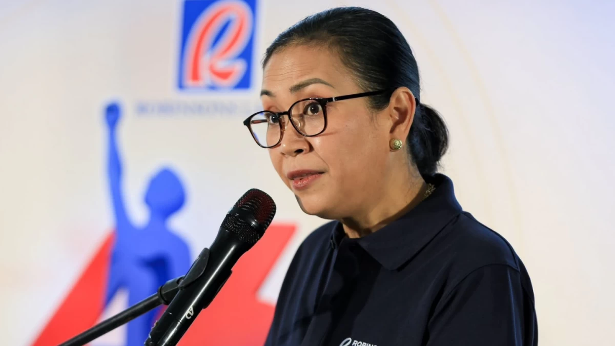 Robinsons Land President Mybelle Aragon-GoBio delivers her address during the street renaming ceremony for John Gokongwei Jr. Boulevard. Aragon-GoBio highlighted how the founder's principles of discipline, prudence, and bold vision continue to guide the company on its 46th anniversary. (Photo by Santi San Juan)