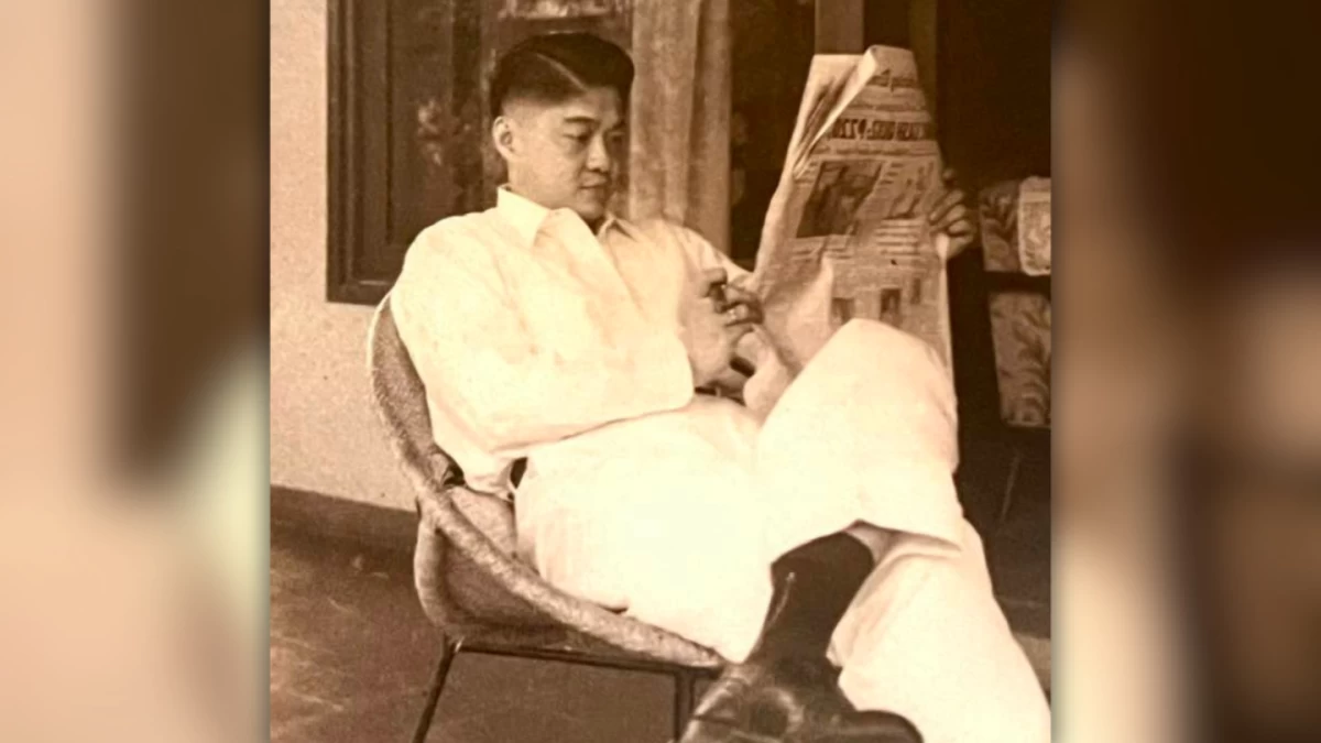 Late industrialist John Gokongwei Jr. pictured reading a newspaper in an archival photo shared on social media by his son, Lance Gokongwei.